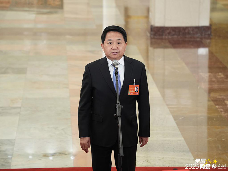 国家市场监督管理总局局长罗文接受采访。人民网记者 许峥摄